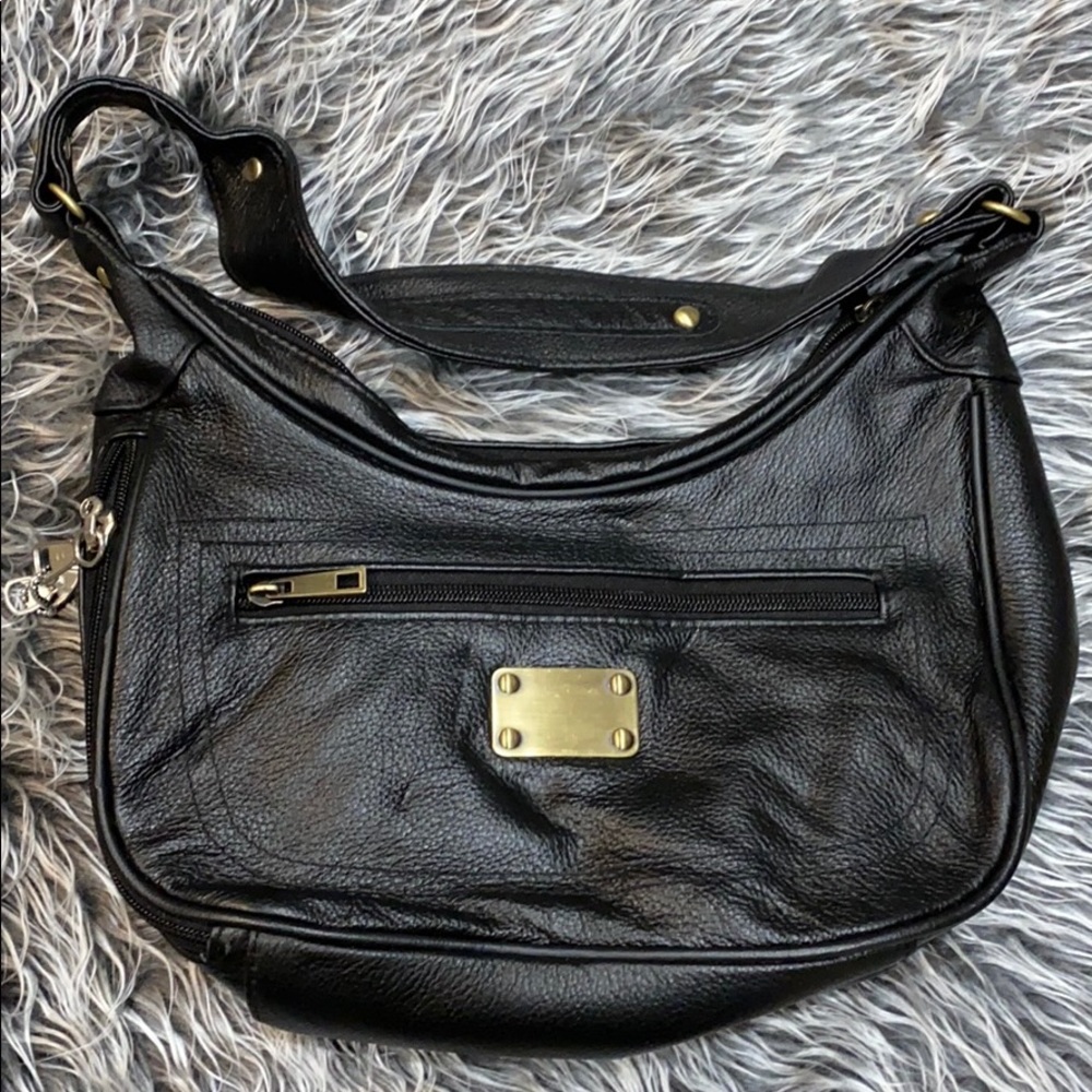 Brand new! Leather shoulder bag with gun holder